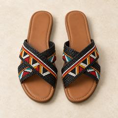 Black woven beaded slip-on sandals